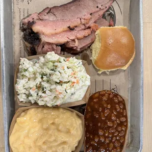 Brisket meal  with Mac n cheese, coleslaw, baked beans, and dinner roll