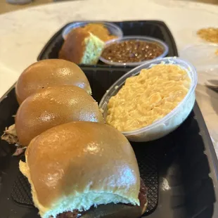 Smokehouse Sliders (turkey, sausage, pulled pork), Side Sampler (macaroni &amp; cheese, beans, sweet potato casserole, cornbread)