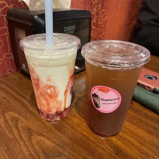 Left large strawberry popper and right large mango iced tea.
