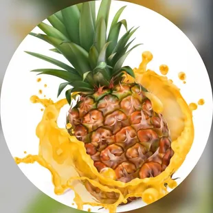 a pineapple with a splash of juice