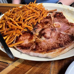Country ham steak (minus a few bites) and sweet potato fries.
