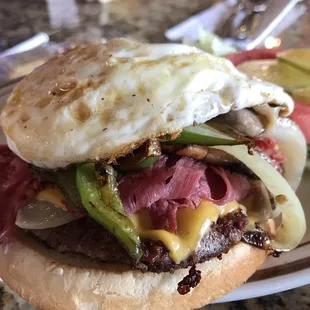 Dang Good Burger: 1/2 pound burger top with cornbeef, Swiss and American cheese, grilled onions,
