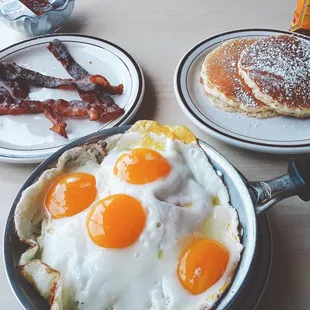 4 Yolks is exactly what you get at this all-day breakfast spot. Pictured: Denver Skillet ($7.20) with pancakes and a side of bacon (+$2.50)