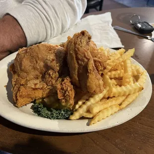 Broasted Chicken with Fries. Hubby says it is the best in the area!