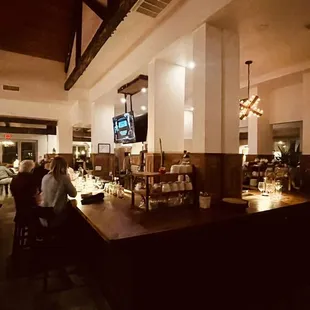 people sitting at the bar