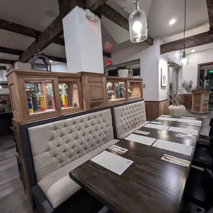 a dining area with a long table