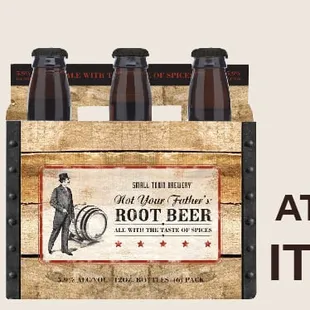 a bottle of root beer and a glass of beer