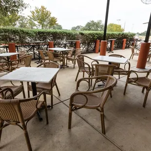 tables and chairs on a patio