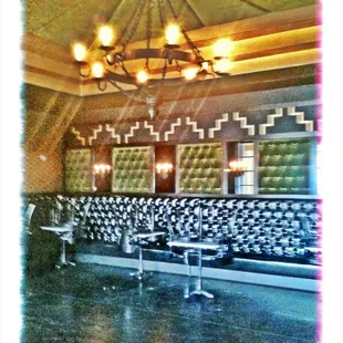 Inside 400 Rabbits in day time. Luv the green velour on walls and ceiling!