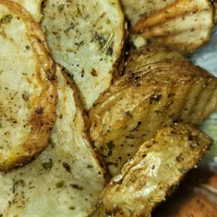 a plate of baked potatoes