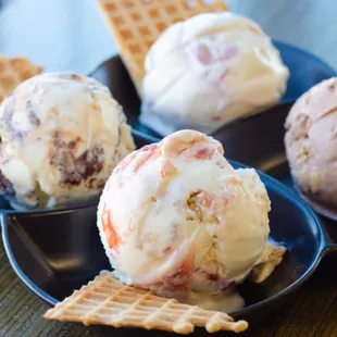 three scoops of ice cream and waffles