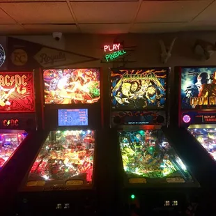 a row of pinball machines