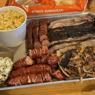 Mac n cheese, cole slaw, hickory and jalapeno sausages, brisket and pulled pork