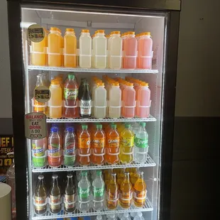 a refrigerator full of drinks