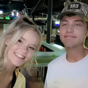 a man and a woman posing for a picture