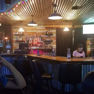 a man sitting at a bar