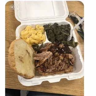 Pulled Pork Sandwich w/ Mac n Cheese and Greens my Co-Worker's food.