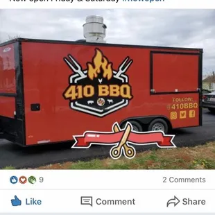 a red food truck on the road