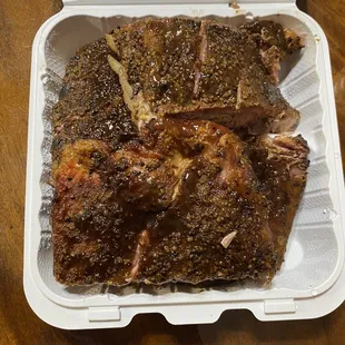 ribs in a styrofoam container