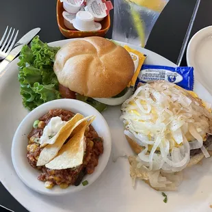 Burger with cheese and grilled onions and a side of Sonora casserole