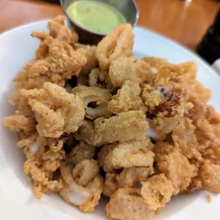 Calamari. $14. Lightly breaded, deep fried, with basil aioli dipping sauce.