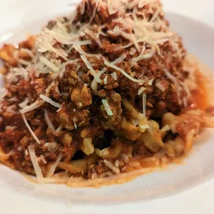 Pappardelle Bolognese. $17. Housemade bolognese sauce, Parmesan cheese.