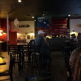 people sitting at the bar