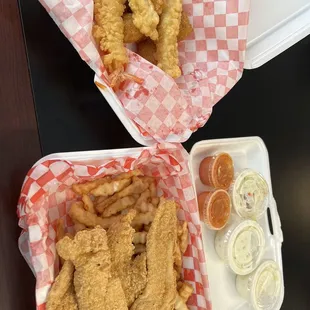 4 piece catfish meal with fries and coleslaw. Side of hush puppies and 4 fried shrimp.