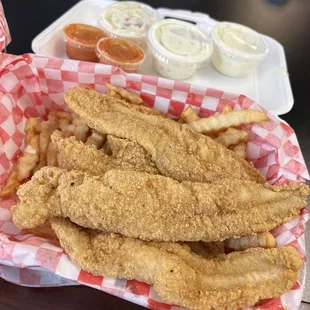 4 piece catfish basket wit fries, coleslaw, tabasco and tartar sauce