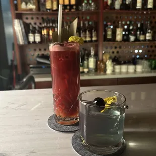 Tall glass: discovery bae Short glass: blue hawaii