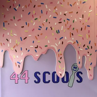 A very cute picture wall for all for your social media posting needs. Love the giant pink sprinkle wall!
