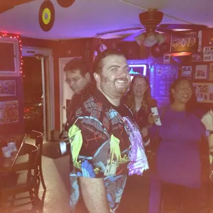 a group of people in a bar