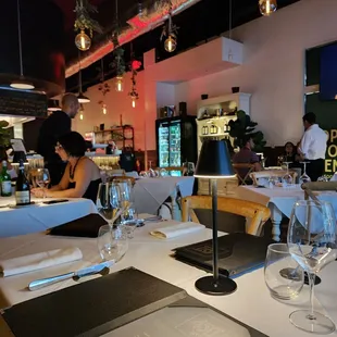 a restaurant with tables and chairs