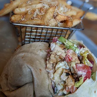 a chicken wrap and fries