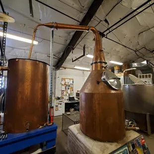 a copper still in a workshop