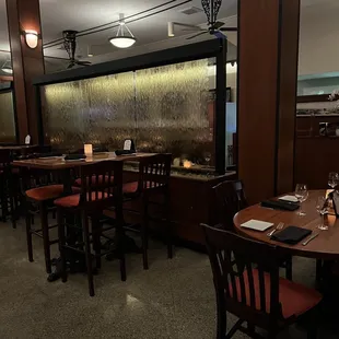 a dining area with a fountain