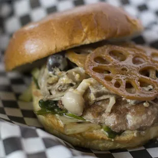 The Japanese.Topped with 5 different kind of mushrooms, braised lotus root, miso/sesame sauce and kurobuta pork patty. Itadakimasu!