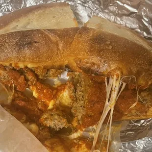 Meatball sub, light on the sauce as requested. Enough for two.