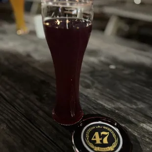 a pint glass and coaster