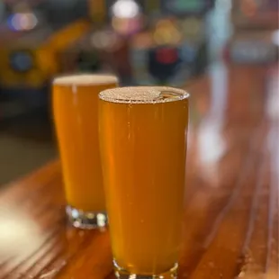 Pink Boots IPA and cool pinball machines in the back