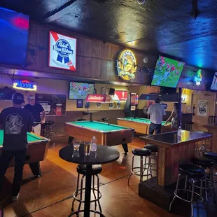billiards, pool tables, and televisions
