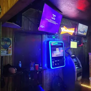 a video game machine and neon lights