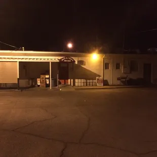 back entrance at night taken from the parking lot