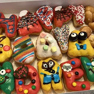a variety of decorated doughnuts