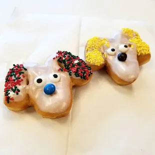 two decorated dogs on a table