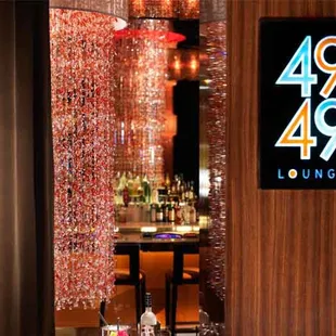 a view of the bar from the dining room