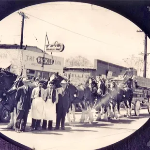Eleno Rojas and His brother in front of their first restaurant.
