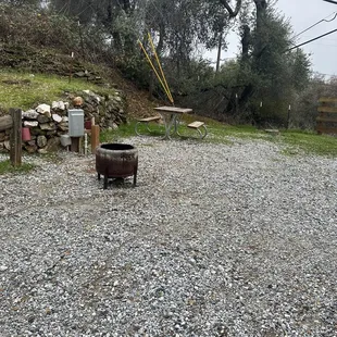 Fire pit and table. As well as electricity in each site