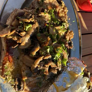 Lemon and Garlic Porkchops covered with mushrooms