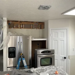 a kitchen being remodeled